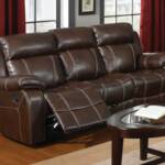 Reclining sofa with drop down table and rocking reclining loveseat with console $1299.95